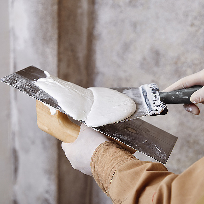 Cimentage, surface murale, lissage des murs, parachèvement intérieur