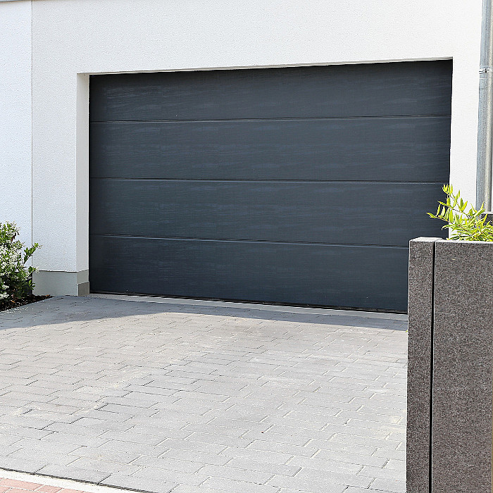 Portes de garage, portes sectionnelles, installaiton, portes motorisées, portes automatiques